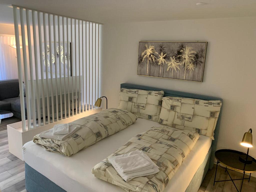 Postel nebo postele na pokoji v ubytování Ferienwohnung Valere B - it's magic gmbh