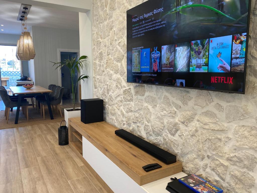 Telewizja i/lub zestaw kina domowego w obiekcie Villa Massari