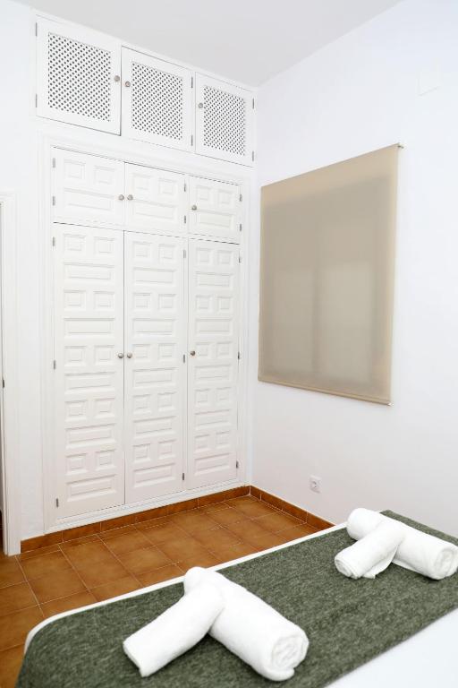 Łóżko lub łóżka w pokoju w obiekcie Casa La Herradura 2
