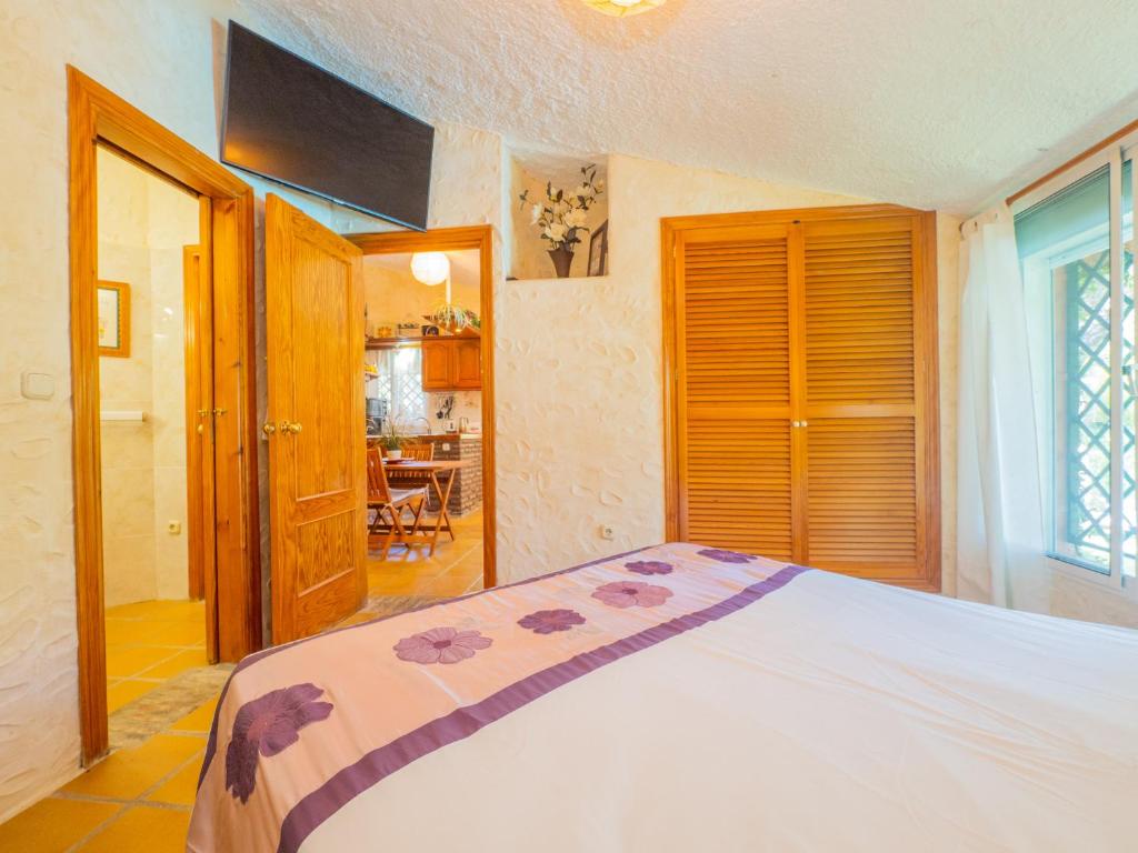 Postel nebo postele na pokoji v ubytování Cubo's Finca La Fuente del Pedregal Casa 3