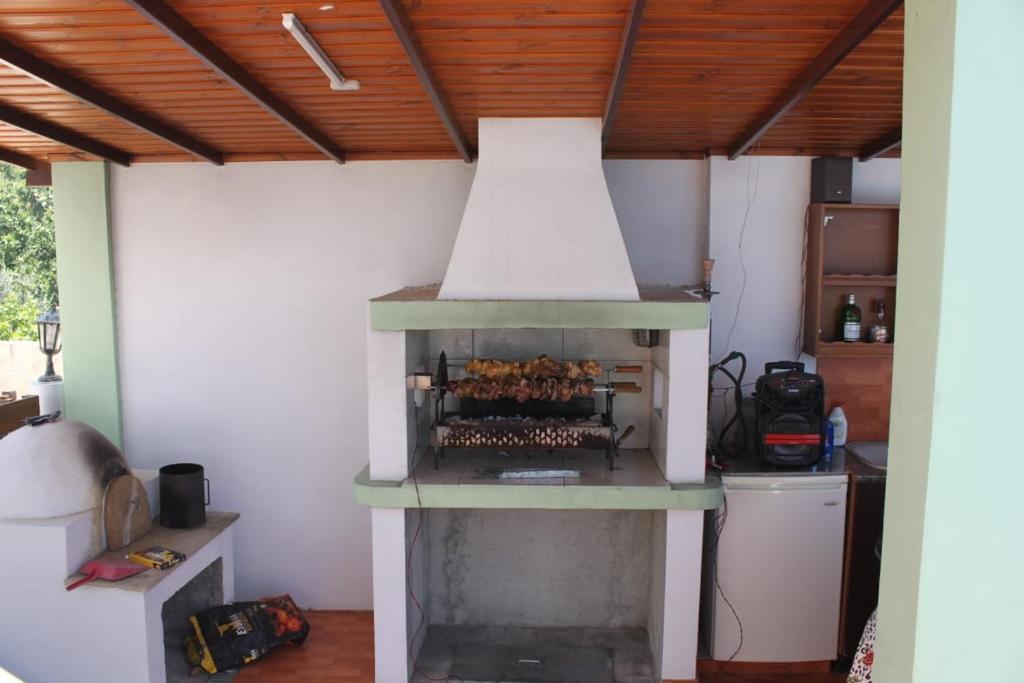 Kuchyň nebo kuchyňský kout v ubytování Yiannos House