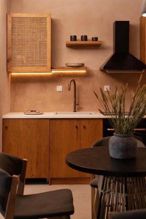 Kuchyňa alebo kuchynka v ubytovaní Opuntia Suites