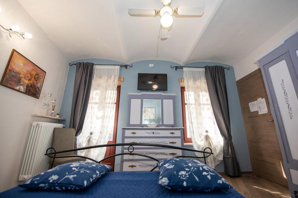Postel nebo postele na pokoji v ubytování IL CORTILETTO 2