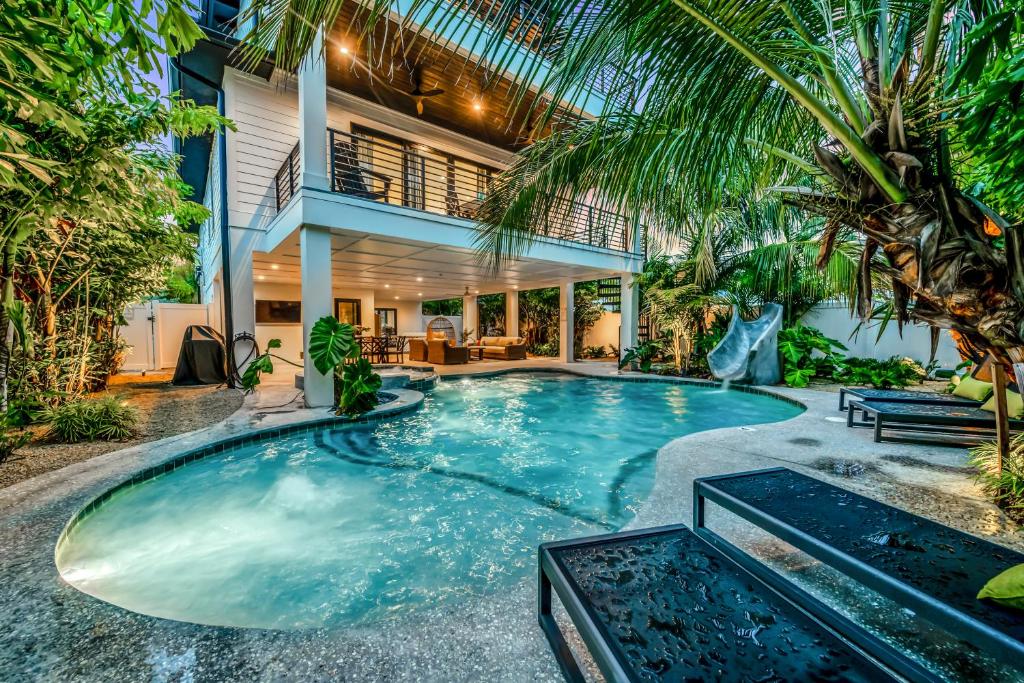 a swimming pool in the backyard of a house at Endless Summer in Sarasota