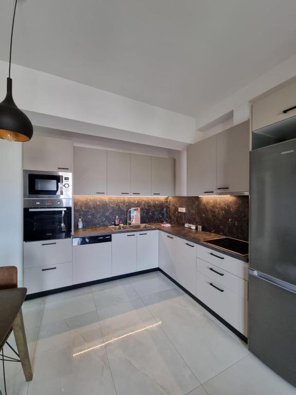 Kuchyňa alebo kuchynka v ubytovaní Fiorzakynthos City Apartments