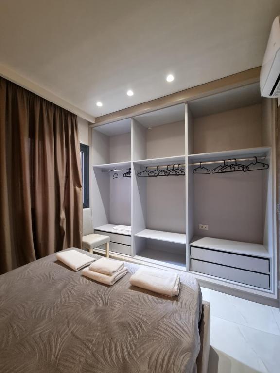Posteľ alebo postele v izbe v ubytovaní Fiorzakynthos City Apartments