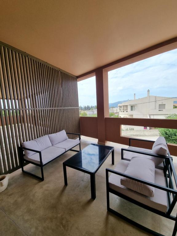 Posedenie v ubytovaní Fiorzakynthos City Apartments