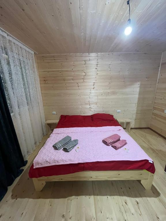 Postel nebo postele na pokoji v ubytování guest house caucasioni