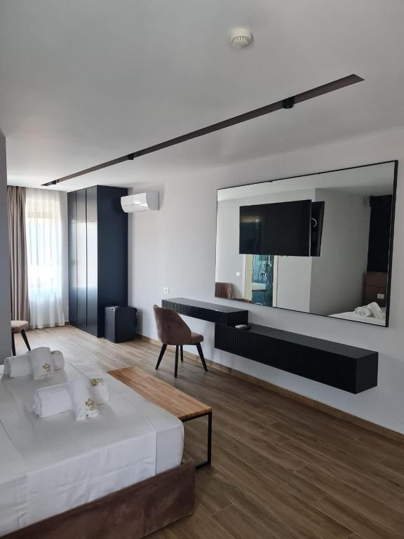 Postel nebo postele na pokoji v ubytování Hotel LEON - Beach Front