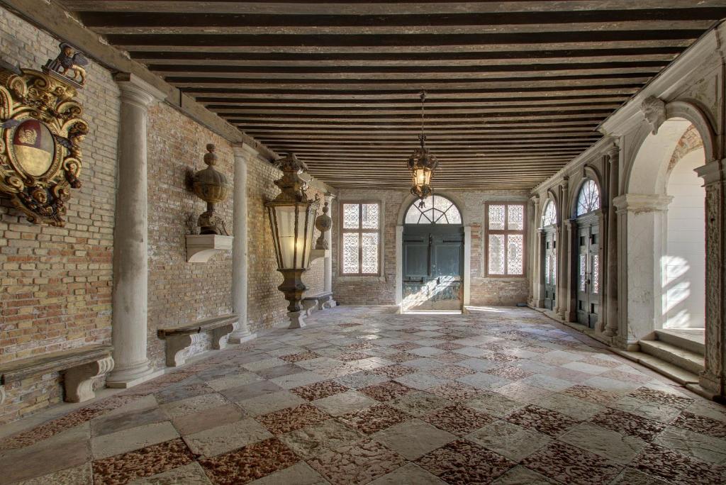 an empty hallway in a building with a ceiling at DOGE STAIR, gorgeous in Venice