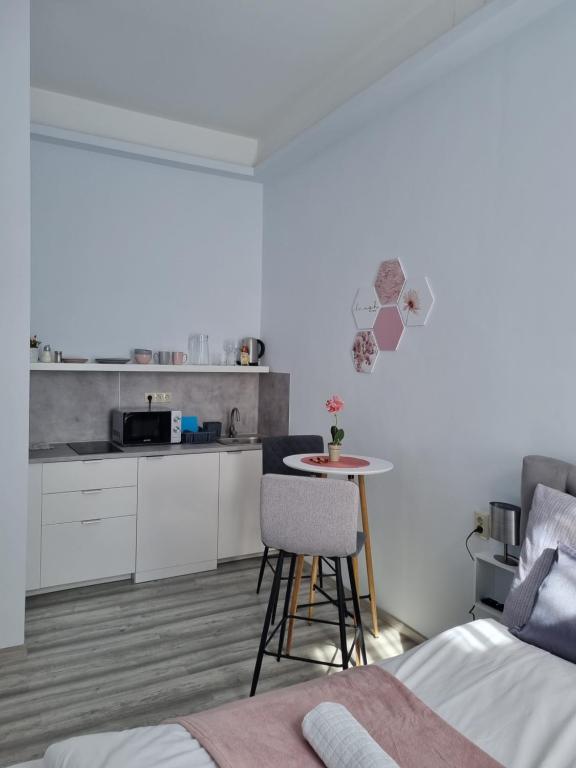Postel nebo postele na pokoji v ubytování Eden City Home