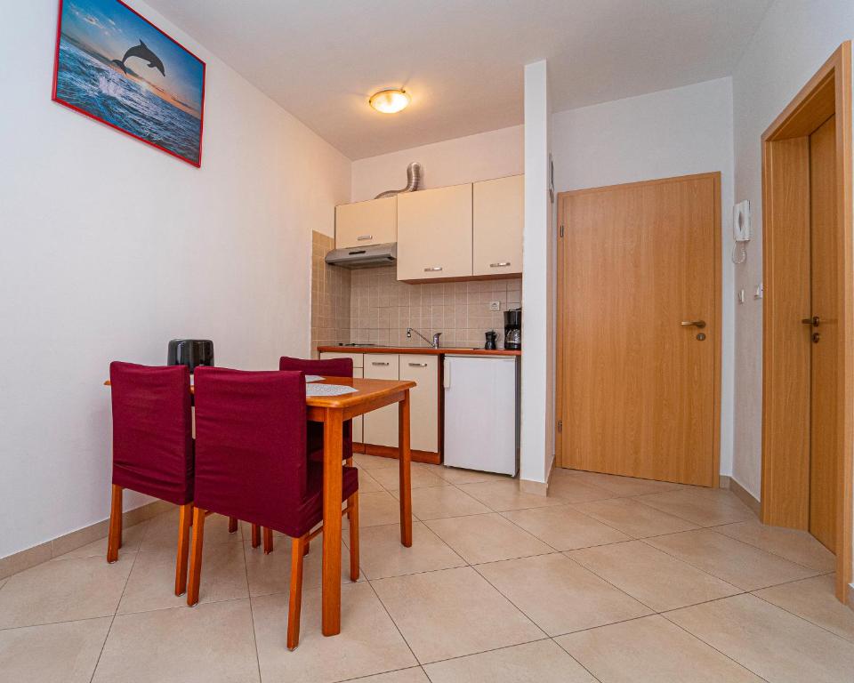 Kuchyň nebo kuchyňský kout v ubytování Apartments Baresic