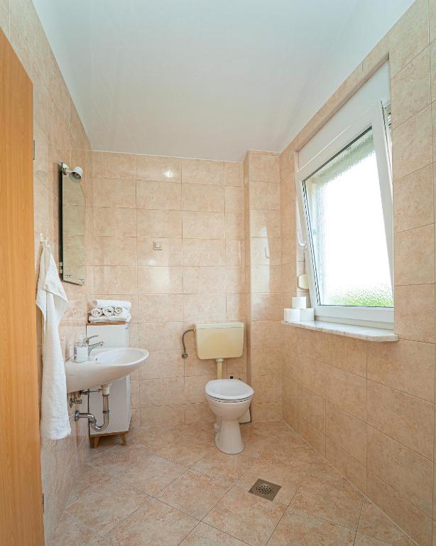 Koupelna v ubytování Apartments Baresic