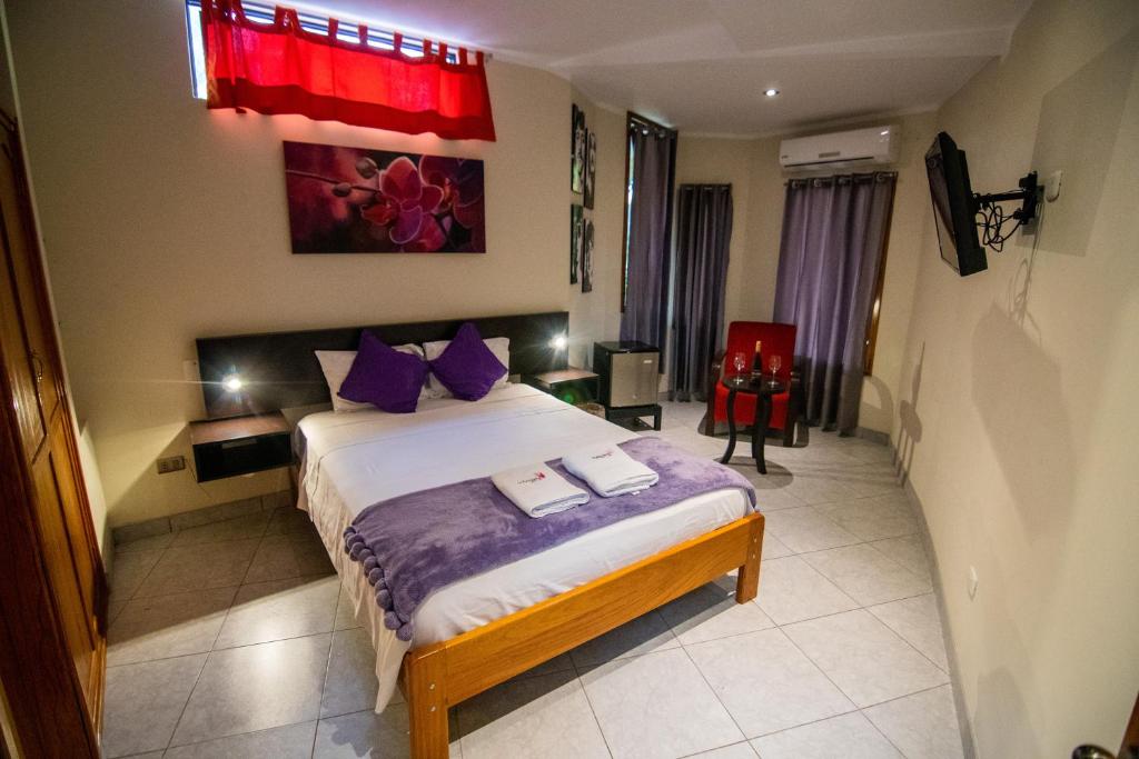 Postel nebo postele na pokoji v ubytování Bubinzana Magical Lodge