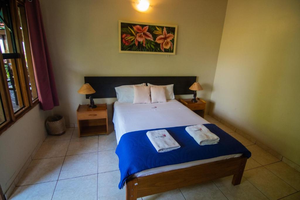 Postel nebo postele na pokoji v ubytování Bubinzana Magical Lodge