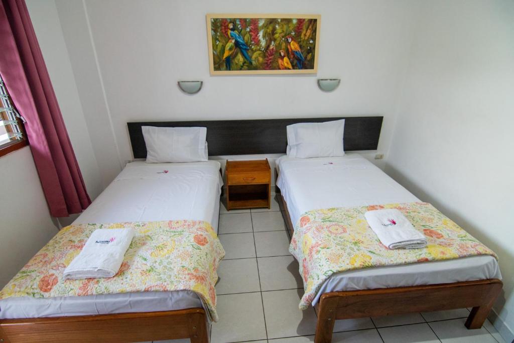 Postel nebo postele na pokoji v ubytování Bubinzana Magical Lodge