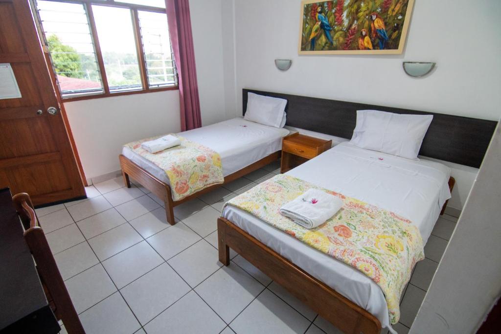 Postel nebo postele na pokoji v ubytování Bubinzana Magical Lodge
