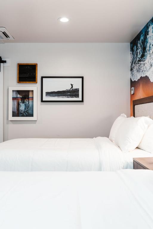 Postel nebo postele na pokoji v ubytování Del Mar Beach Hotel
