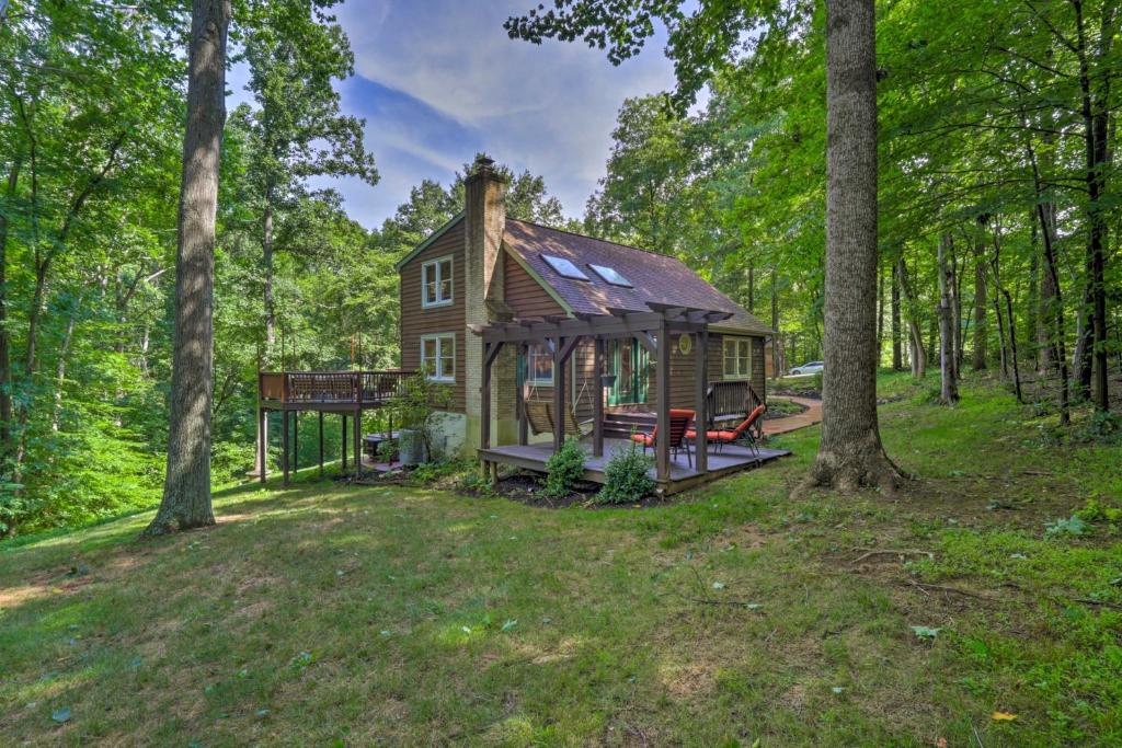 a tiny house in the woods with a gazebo at Secluded Leesburg Retreat with Private Hot Tub! in Middleburg