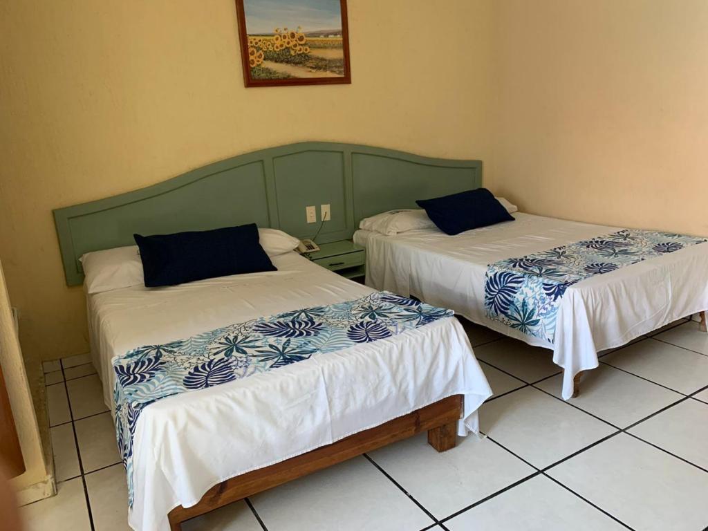 Postel nebo postele na pokoji v ubytování Hotel Jar8 Boca -Cerca WTC y plazas comerciales-