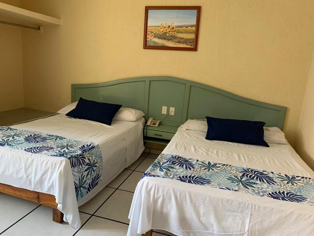 Postel nebo postele na pokoji v ubytování Hotel Jar8 Boca -Cerca WTC y plazas comerciales-
