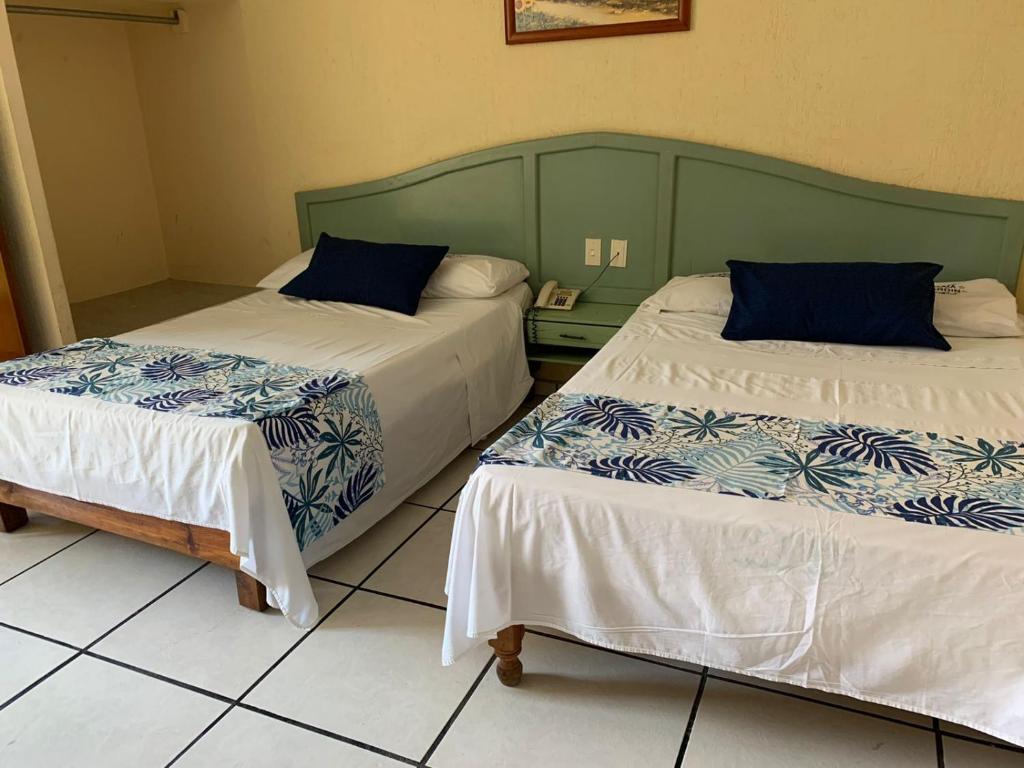 Postel nebo postele na pokoji v ubytování Hotel Jar8 Boca -Cerca WTC y plazas comerciales-