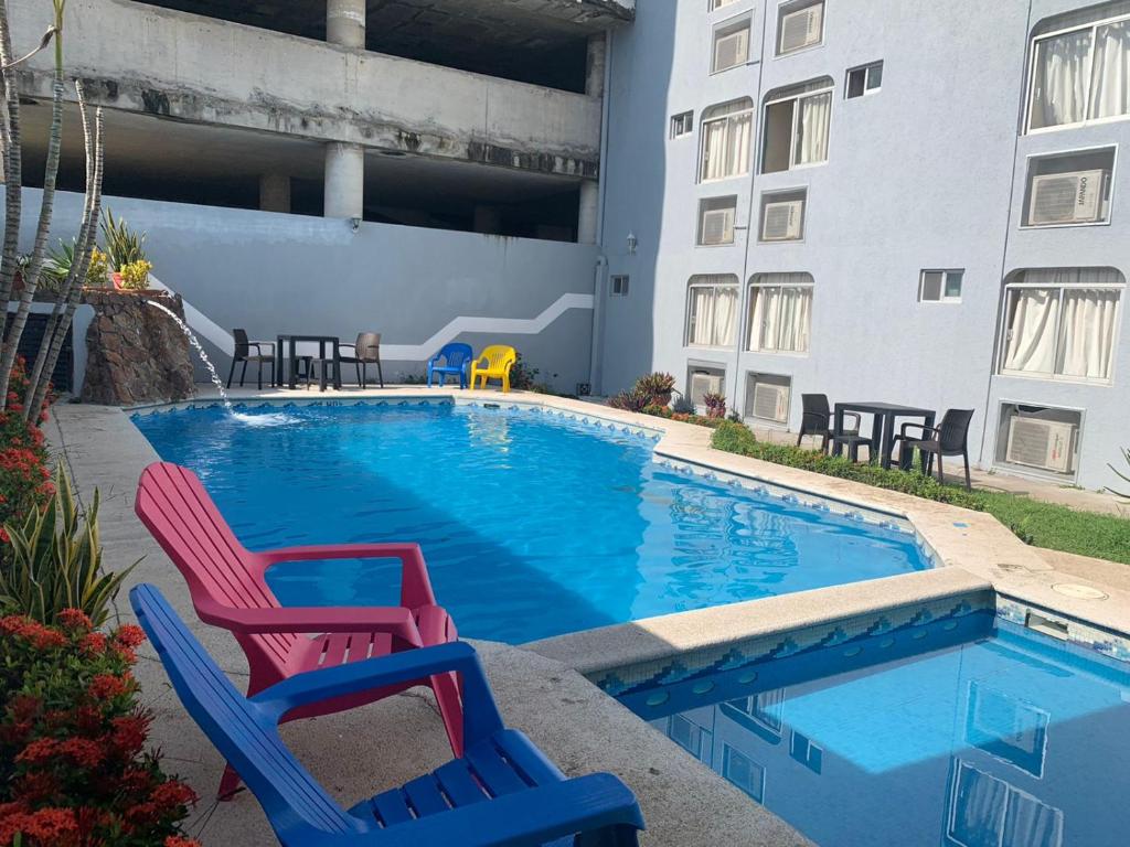 Bazén v ubytování Hotel Jar8 Boca -Cerca WTC y plazas comerciales- nebo v jeho okolí