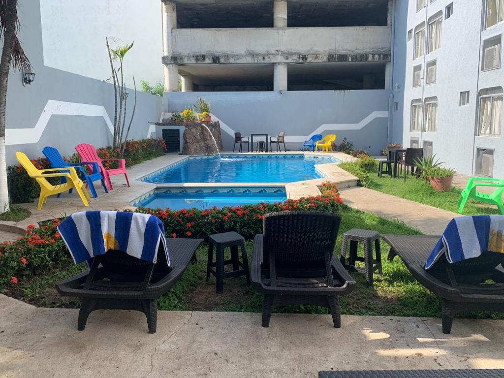Bazén v ubytování Hotel Jar8 Boca -Cerca WTC y plazas comerciales- nebo v jeho okolí