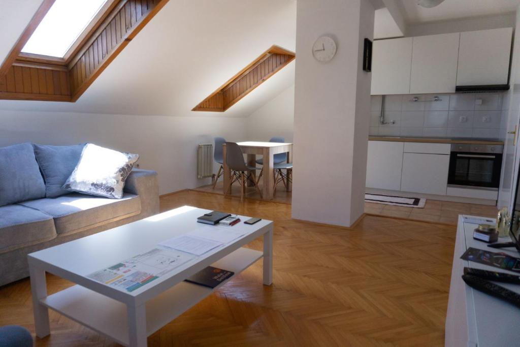 Kuchyň nebo kuchyňský kout v ubytování Apartment Sunshine
