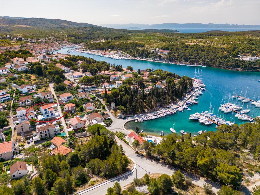 an aerial view of a harbor with boats at ameli in Milna