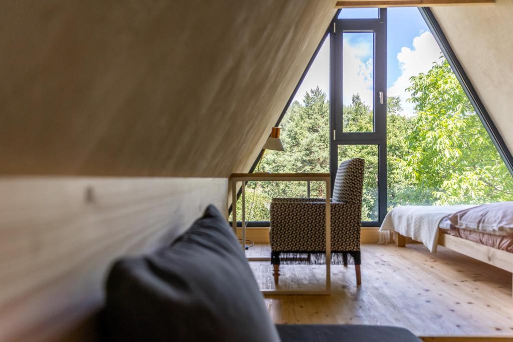 Postel nebo postele na pokoji v ubytování Domček strýka Ivana