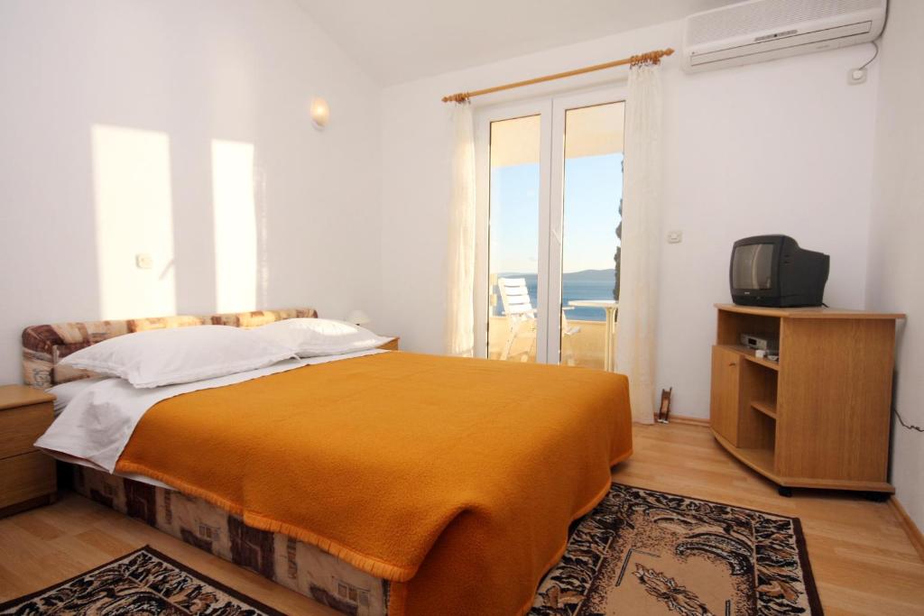Posteľ alebo postele v izbe v ubytovaní Apartment Pisak 5975d