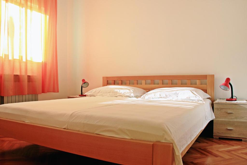 Apartments by the sea Businci, Ciovo - 6012 - Two-Bedroom Apartment With Terrace And Sea View