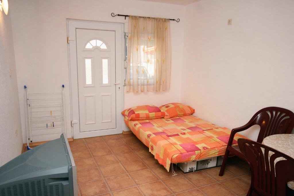 Posteľ alebo postele v izbe v ubytovaní Apartment Podaca 6050a