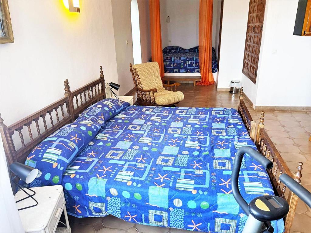 Postel nebo postele na pokoji v ubytování Belvilla by OYO Villa Gaby