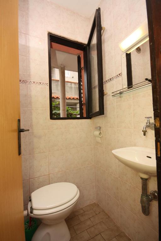 Kúpeľňa v ubytovaní Apartment Nin 6149b