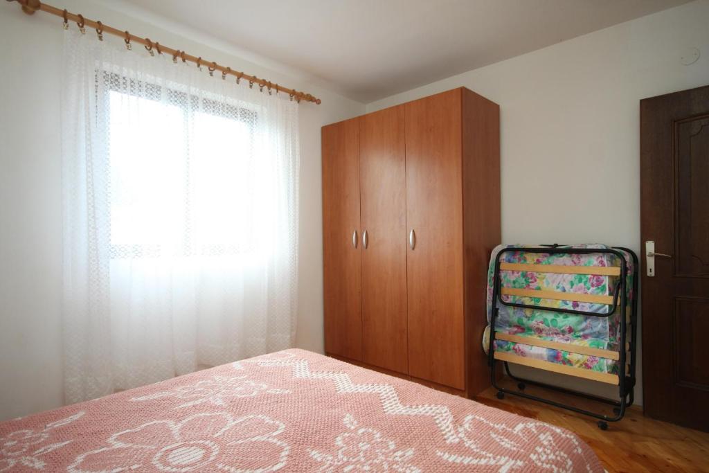 Posteľ alebo postele v izbe v ubytovaní Apartment Premantura 7462b