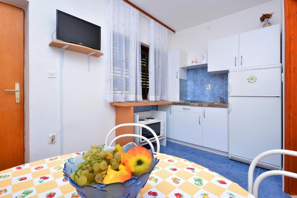 Kuchyňa alebo kuchynka v ubytovaní Apartment Pisak 7521c