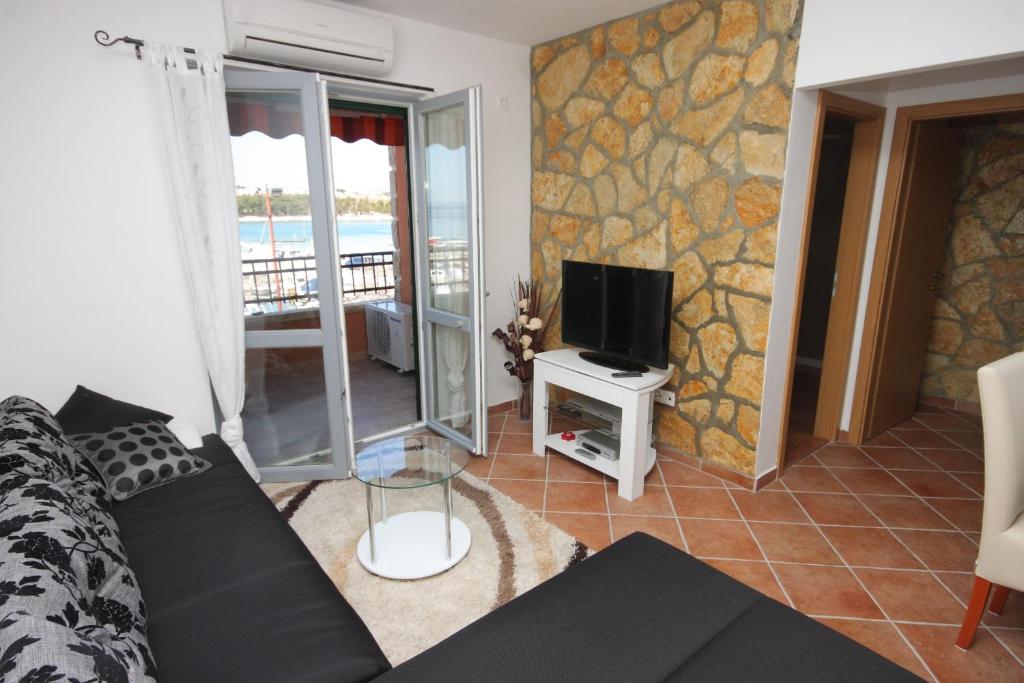 Fotografia z galérie ubytovania Apartments by the sea Podstrana, Split - 7594 v destinácii Podstrana