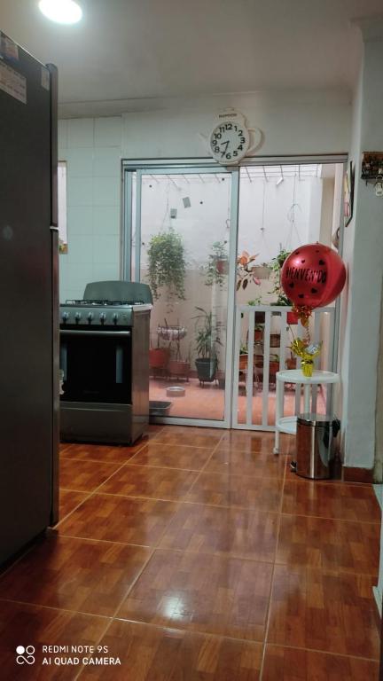مطبخ أو مطبخ صغير في Agradable casa para una excelente estadía.