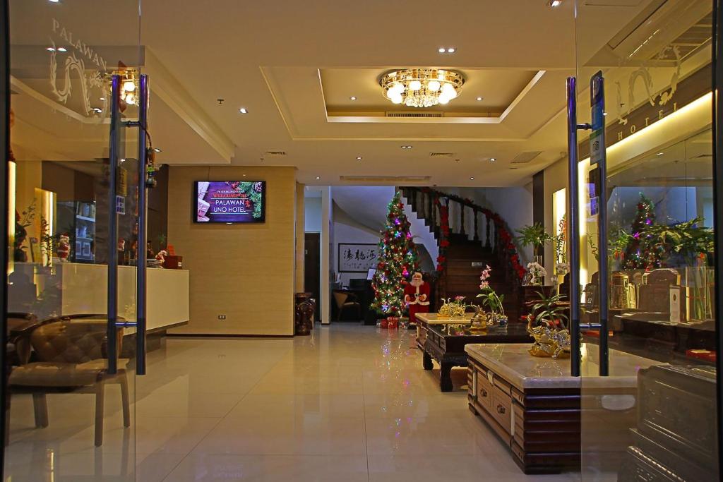 TV a/nebo společenská místnost v ubytování Palawan Uno Hotel