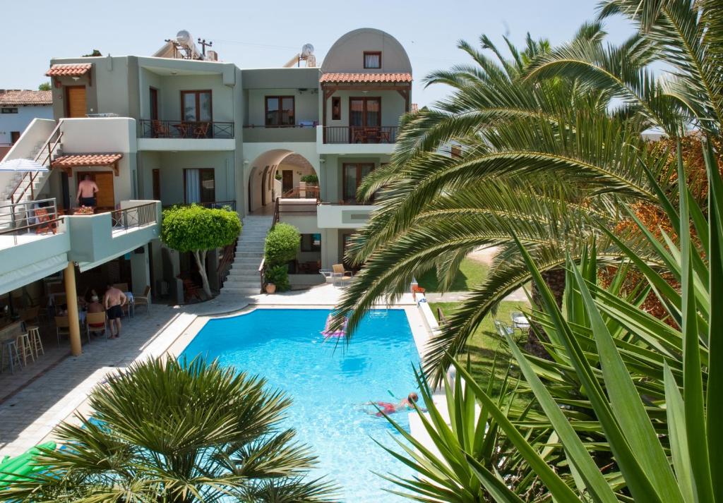 an aerial view of a hotel with a swimming pool at Casa Maria Hotel Apts in Platanias