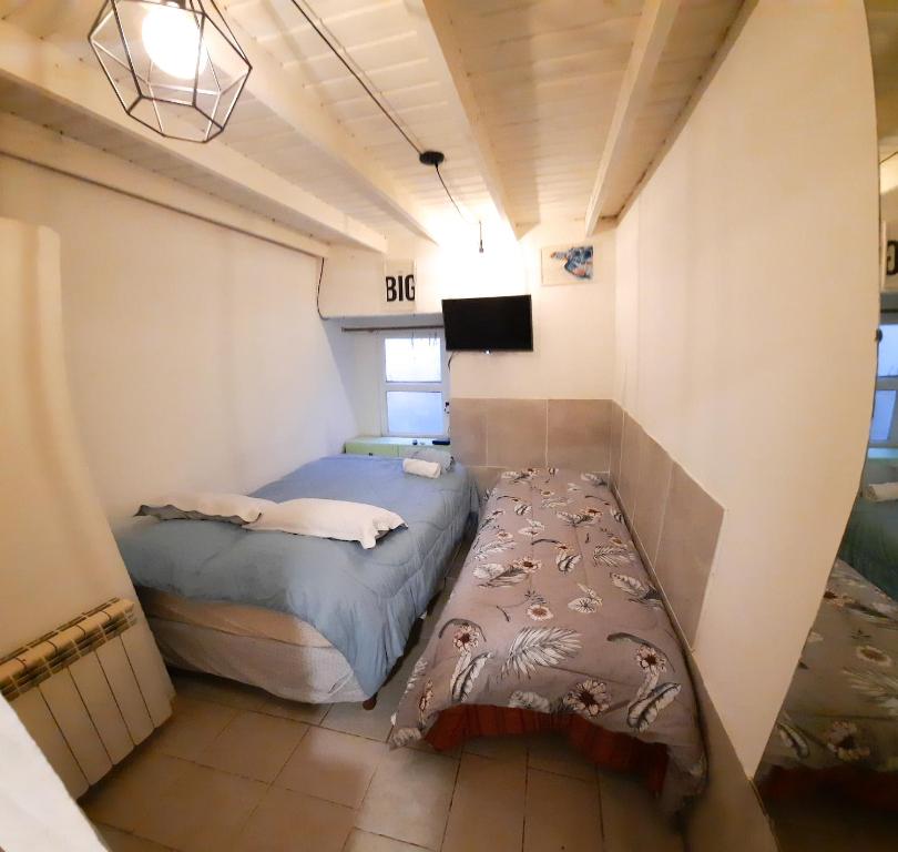 Cama o camas de una habitación en monoambiente 600 mts del centro