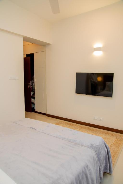 Postel nebo postele na pokoji v ubytování ARON'S Lavinia RUBY