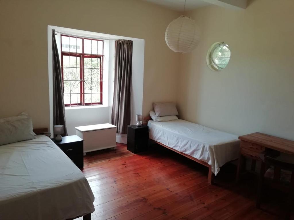 En eller flere senge i et værelse på Restful Tree House in Little Mowbray