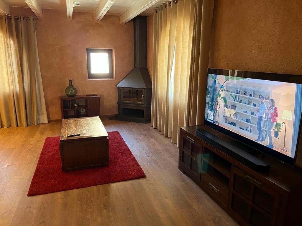 TV a/nebo společenská místnost v ubytování COMANEGRA