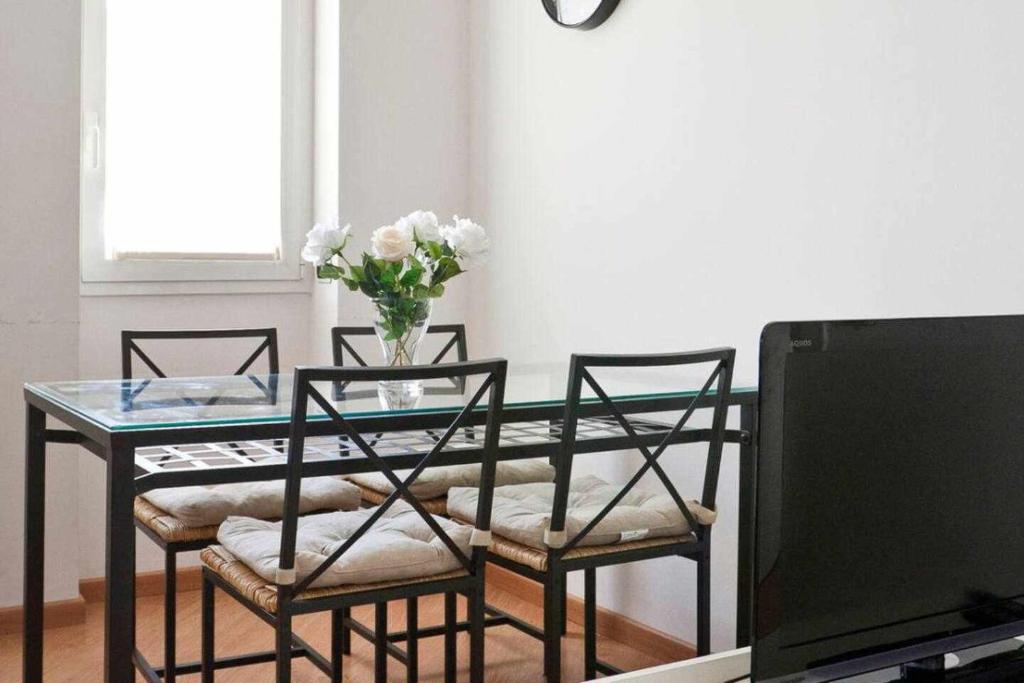 Televízia a/alebo spoločenská miestnosť v ubytovaní SV18C Charming modern flat S Ambrogio