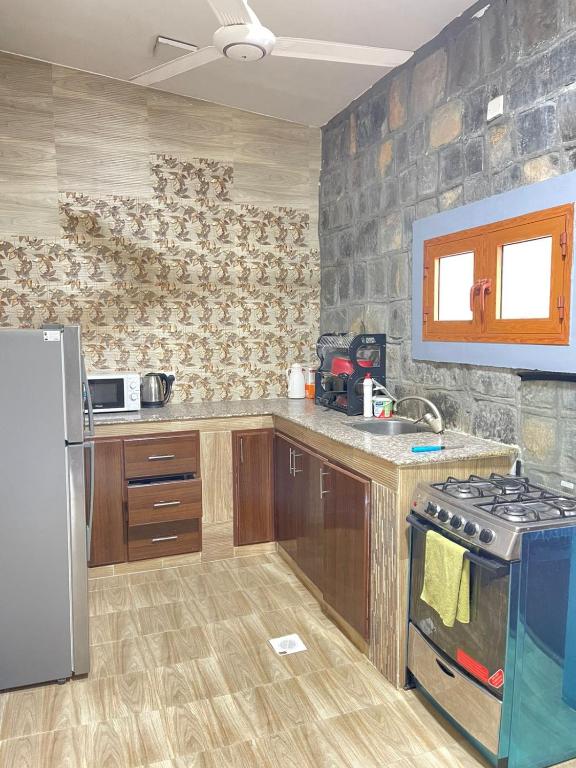 Kuchyň nebo kuchyňský kout v ubytování Jabal Shams Villa