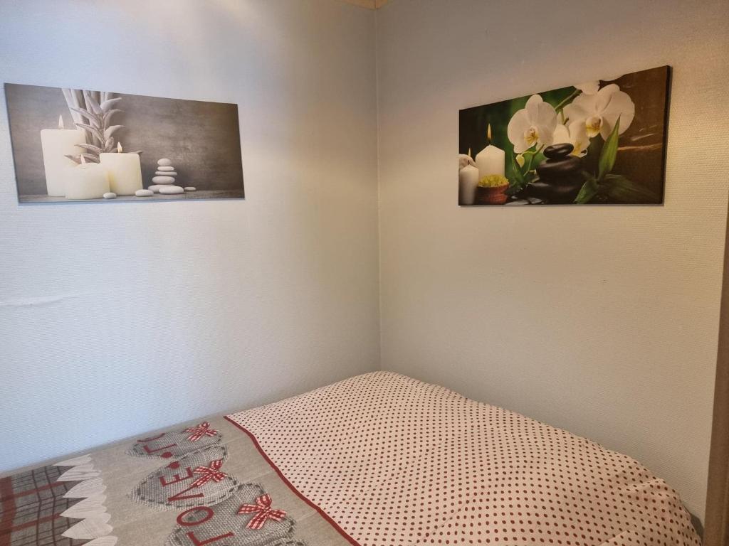Postel nebo postele na pokoji v ubytování Les deux écureuils