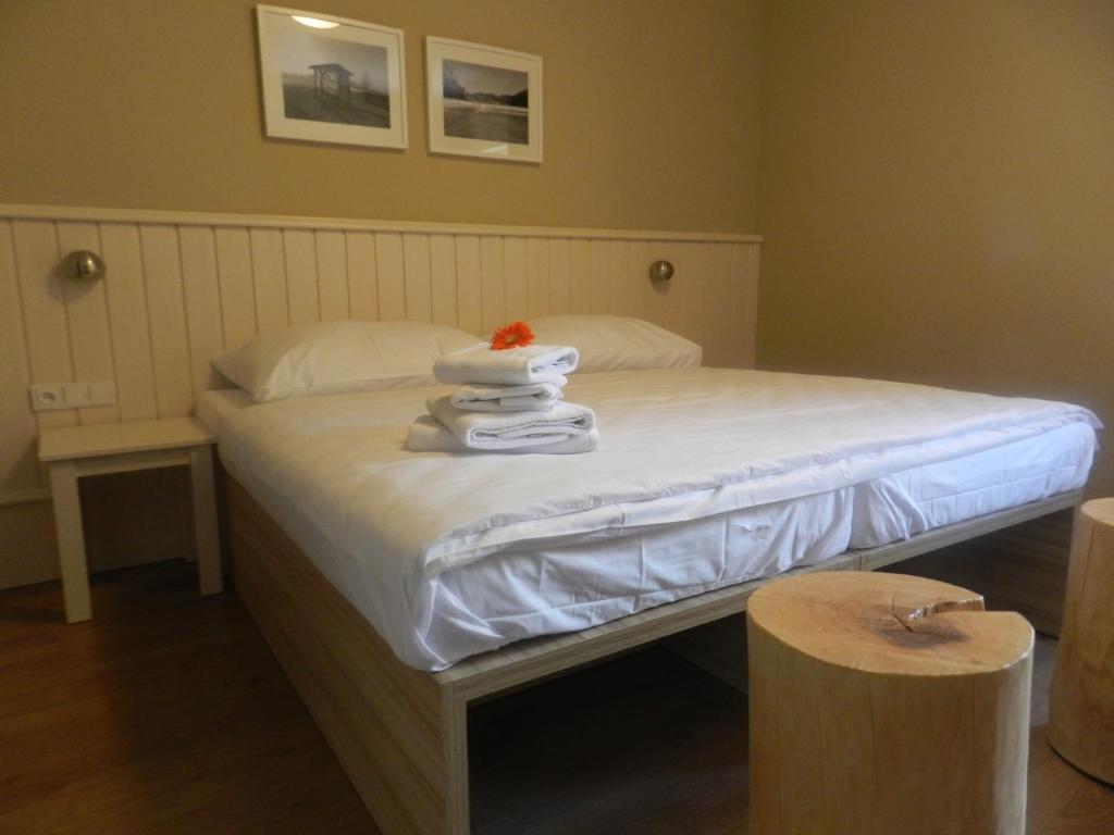 Postel nebo postele na pokoji v ubytování Wellness Hotel Bozeňov